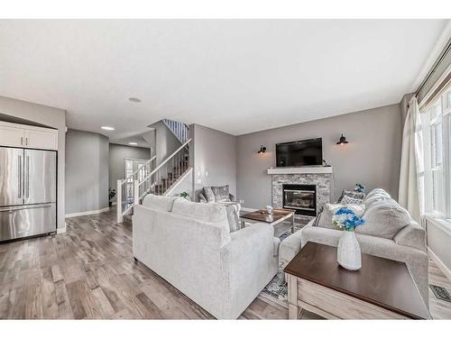 184 West Creek Boulevard, Chestermere, AB - Indoor Photo Showing Living Room With Fireplace