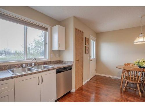 68 Martin Crossing Court Ne, Calgary, AB - Indoor Photo Showing Kitchen With Double Sink