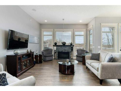 824 Royal Court Nw, Calgary, AB - Indoor Photo Showing Living Room With Fireplace