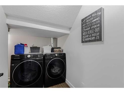 108 Cantree Place Sw, Calgary, AB - Indoor Photo Showing Laundry Room
