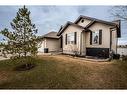 1413 Sunshine Place Se, High River, AB  - Outdoor With Facade 
