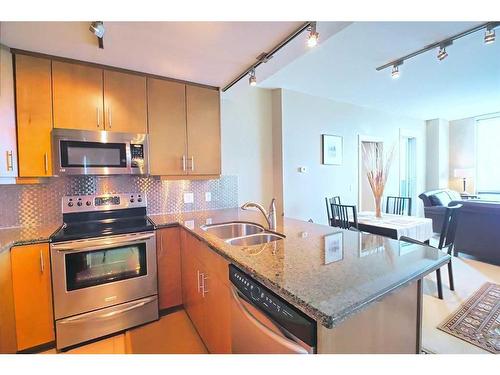 3007-210 15 Avenue Se, Calgary, AB - Indoor Photo Showing Kitchen With Stainless Steel Kitchen With Double Sink