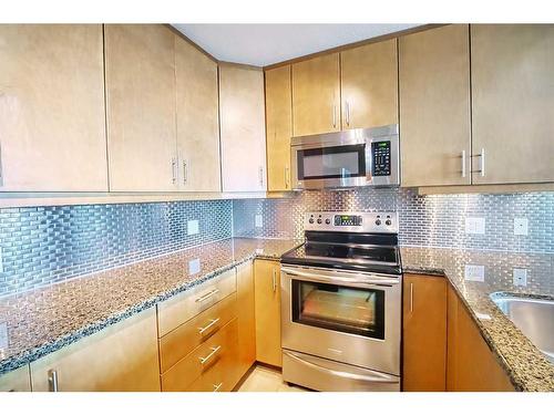3007-210 15 Avenue Se, Calgary, AB - Indoor Photo Showing Kitchen With Stainless Steel Kitchen With Upgraded Kitchen