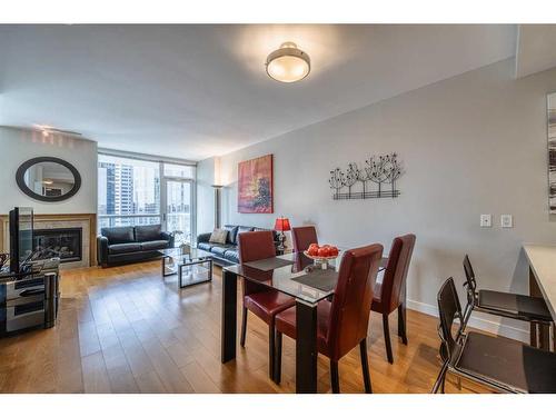1216-222 Riverfront Avenue Sw, Calgary, AB - Indoor With Fireplace