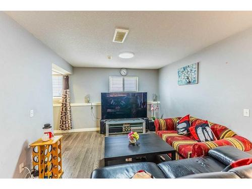 120 Taracove Crescent Ne, Calgary, AB - Indoor Photo Showing Living Room