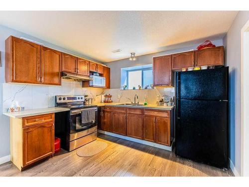 120 Taracove Crescent Ne, Calgary, AB - Indoor Photo Showing Kitchen