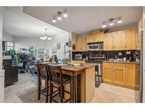 2417-5605 Henwood Street Sw, Calgary, AB - Indoor Photo Showing Kitchen With Double Sink