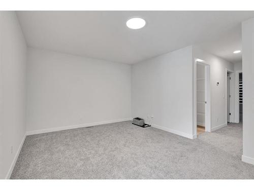 105 Creekstone Path Sw, Calgary, AB - Indoor Photo Showing Other Room