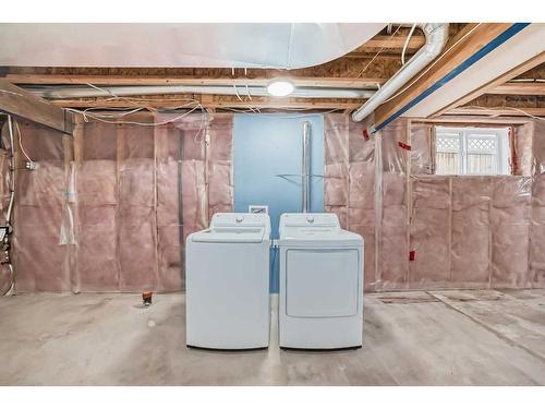 4 Valley Crest Gardens Nw, Calgary, AB - Indoor Photo Showing Laundry Room