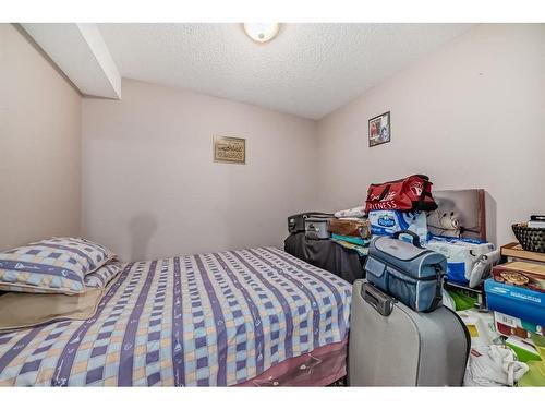 204-92 Saddletree Court Ne, Calgary, AB - Indoor Photo Showing Bedroom