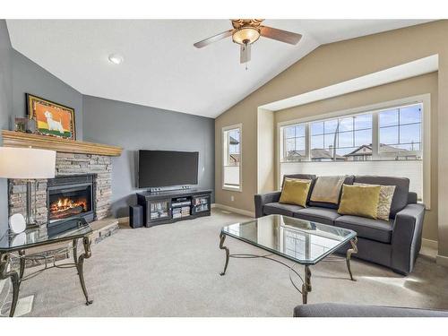 258 Cranfield Gardens Se, Calgary, AB - Indoor Photo Showing Living Room With Fireplace