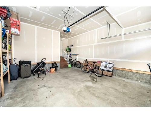 965 Midtown Avenue Sw, Airdrie, AB - Indoor Photo Showing Garage