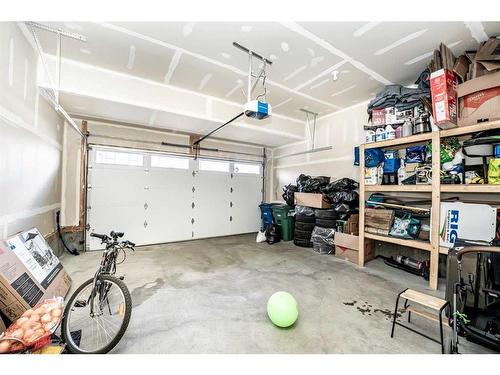 965 Midtown Avenue Sw, Airdrie, AB - Indoor Photo Showing Garage