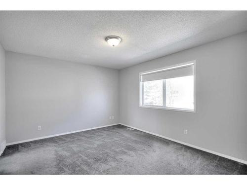 26 Rocky Ridge Circle Nw, Calgary, AB - Indoor Photo Showing Other Room