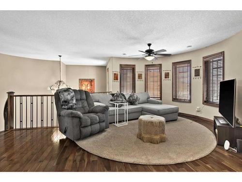 6 Rockcliff Landing Nw, Calgary, AB - Indoor Photo Showing Living Room