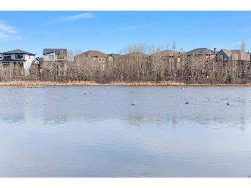 6 Rockcliff Landing Nw, Calgary, AB - Outdoor With Body Of Water With View