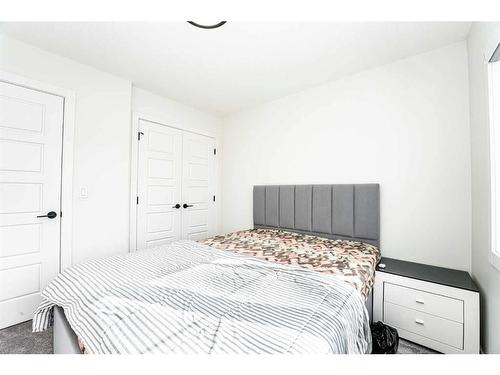 202 Dawson Harbour Rise, Chestermere, AB - Indoor Photo Showing Bedroom