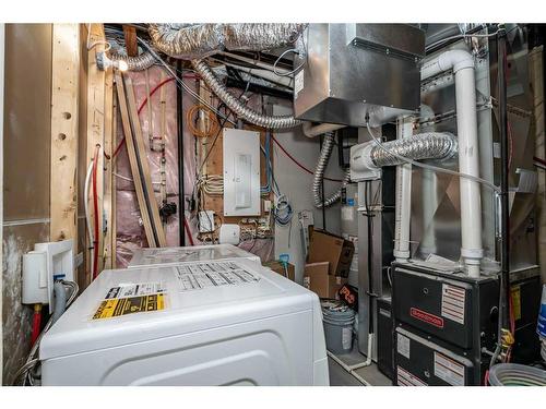 202 Dawson Harbour Rise, Chestermere, AB - Indoor Photo Showing Laundry Room