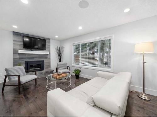 120 Midridge Close Se, Calgary, AB - Indoor Photo Showing Living Room With Fireplace