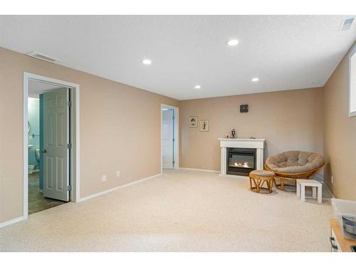 21 Everhollow Rise Sw, Calgary, AB - Indoor With Fireplace