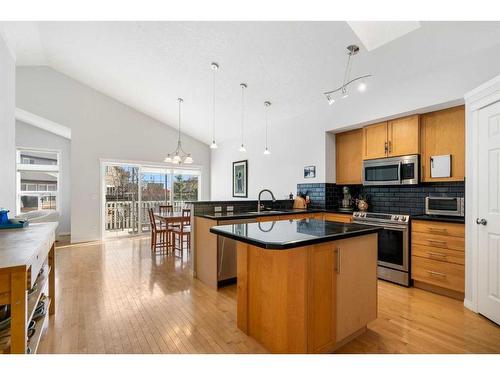 21 Everhollow Rise Sw, Calgary, AB - Indoor Photo Showing Kitchen With Stainless Steel Kitchen With Upgraded Kitchen