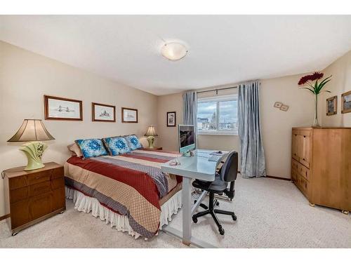 99 Eversyde Circle Sw, Calgary, AB - Indoor Photo Showing Bedroom