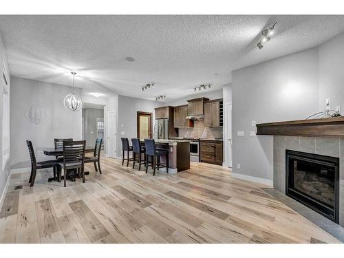 1751 Legacy Circle Se, Calgary, AB - Indoor With Fireplace