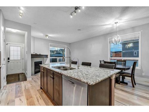 1751 Legacy Circle Se, Calgary, AB - Indoor Photo Showing Kitchen With Double Sink