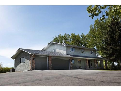 98051 2248 Drive East, Rural Foothills County, AB - Outdoor With Facade