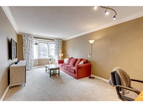 108 Cedarwood Lane Sw, Calgary, AB - Indoor Photo Showing Living Room