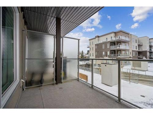 212-150 Shawnee Square Sw, Calgary, AB - Outdoor With Balcony With Exterior