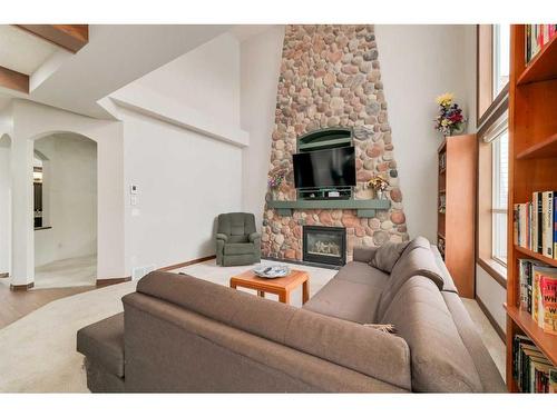 359 Chaparral Drive Se, Calgary, AB - Indoor Photo Showing Living Room With Fireplace