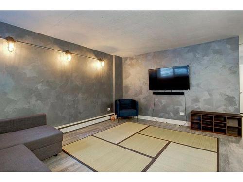 101-1027 Cameron Avenue Sw, Calgary, AB - Indoor With Fireplace