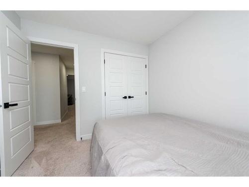 42 Ambleside Rise Nw, Calgary, AB - Indoor Photo Showing Bedroom