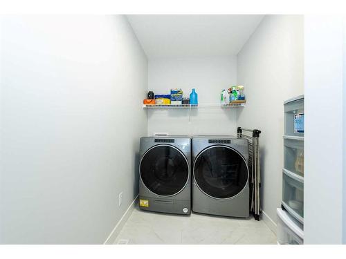 42 Ambleside Rise Nw, Calgary, AB - Indoor Photo Showing Laundry Room