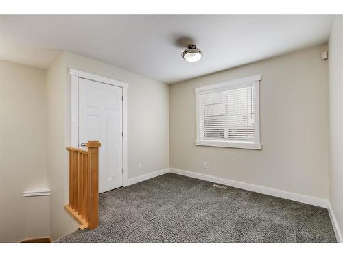 151-100 Coopers Common Sw, Airdrie, AB - Indoor Photo Showing Other Room