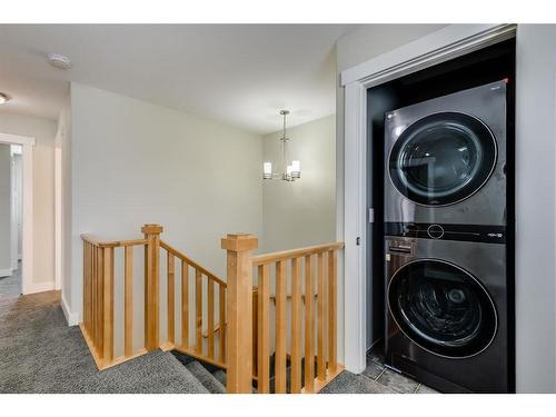 151-100 Coopers Common Sw, Airdrie, AB - Indoor Photo Showing Laundry Room