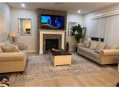 35 Cityspring Manor Ne, Calgary, AB - Indoor Photo Showing Living Room With Fireplace