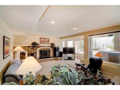80 Edenstone Way Nw, Calgary, AB - Indoor Photo Showing Other Room With Fireplace