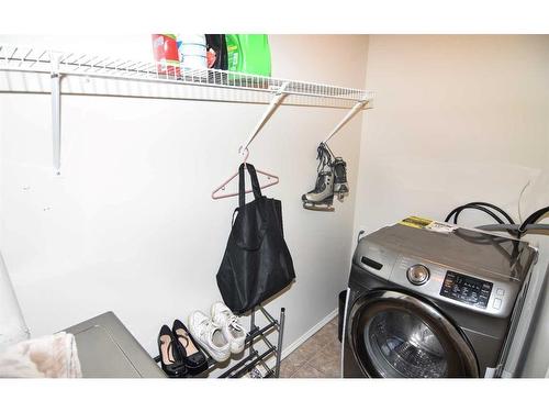 222 Reunion Court Nw, Airdrie, AB - Indoor Photo Showing Laundry Room