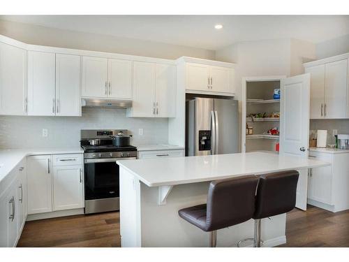 16 Dawson Harbour Villas, Chestermere, AB - Indoor Photo Showing Kitchen With Stainless Steel Kitchen With Upgraded Kitchen
