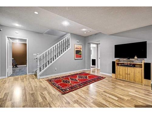 28 Canova Road Sw, Calgary, AB - Indoor With Fireplace