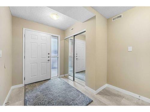 10 Coachway Gardens Sw, Calgary, AB - Indoor Photo Showing Other Room