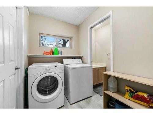 10 Coachway Gardens Sw, Calgary, AB - Indoor Photo Showing Laundry Room