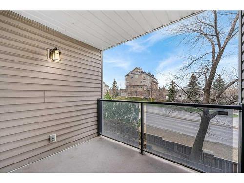 10 Coachway Gardens Sw, Calgary, AB - Outdoor With Balcony With Exterior
