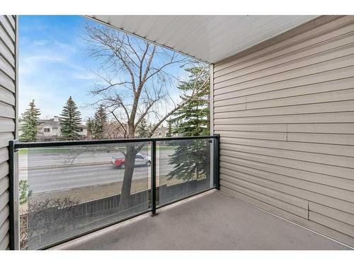 10 Coachway Gardens Sw, Calgary, AB - Outdoor With Balcony With Exterior
