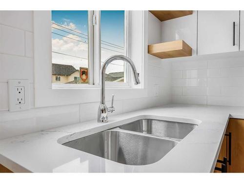 81 Martinvalley Place, Calgary, AB - Indoor Photo Showing Kitchen With Double Sink