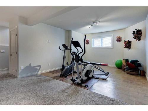 216 Signal Hill Place Sw, Calgary, AB - Indoor Photo Showing Gym Room