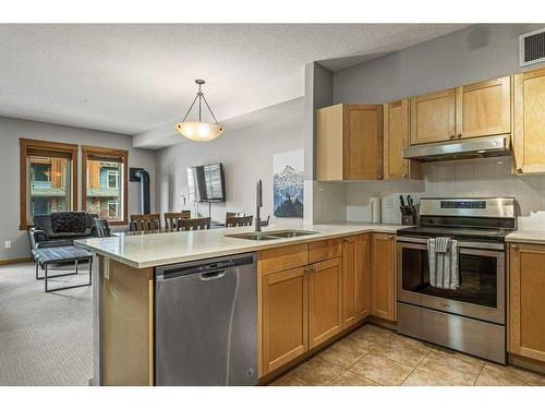 212-109 Montane Road, Canmore, AB - Indoor Photo Showing Kitchen With Double Sink