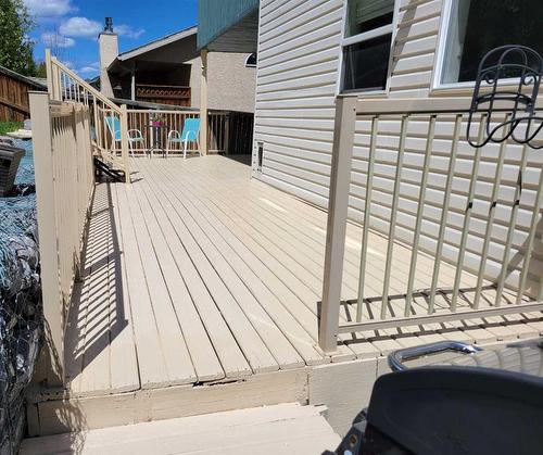 11 Bow Ridge Road, Cochrane, AB - Outdoor With Balcony With Exterior